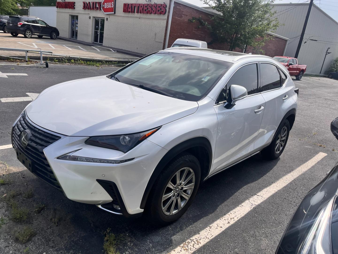 2019 white Lexus NX 200t (JTJBARBZ9K2) , located at 945 E. Jefferson Blvd, Dallas, TX, 75203, (214) 943-7777, 32.752514, -96.811630 - Photo#1